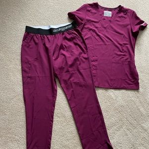Sketchers burgundy scrub set. Top is medium. Bottoms are large. Selling as a set
